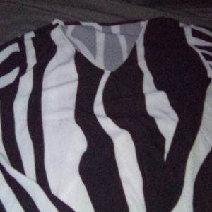 Black and white zebra print top with tie. NvrWrn